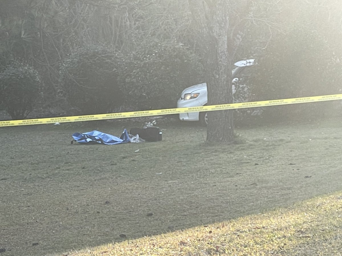 Gwinnett PD says a man in this white suv crashed into this residents front yard early this morning.Initially they thought he just lost control of his car but a closer look inside revealed he was shot to death beforehand. I'm out here talking to neighbors