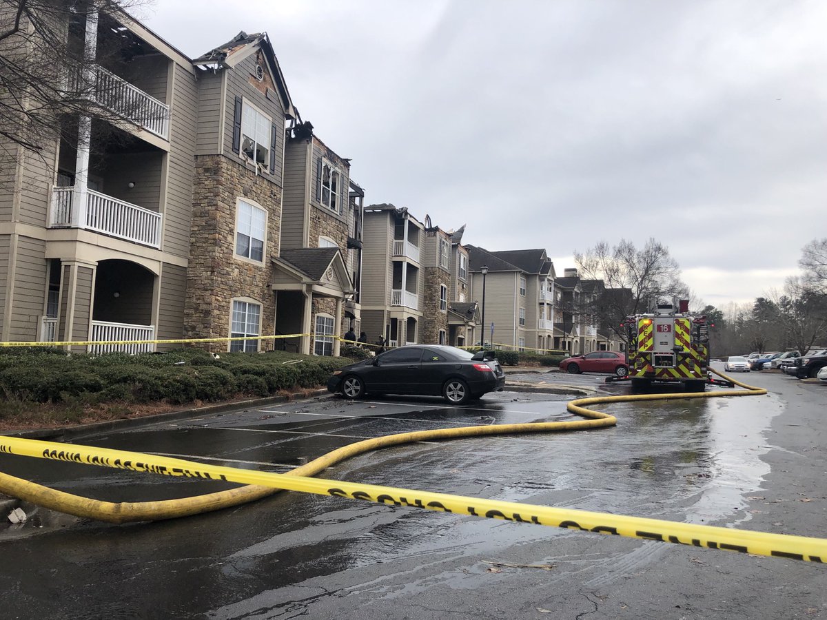 Fire crews are still on scene nearly 24 hours after a fire at the Wesley Providence Apartments in Stonecrest. The Red Cross is helping 37 displaced people
