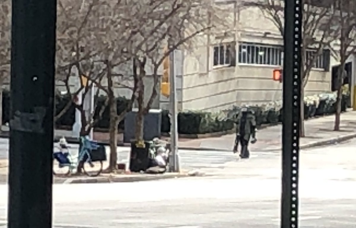 Bomb tech approaches suspicious package in downtown Atlanta.