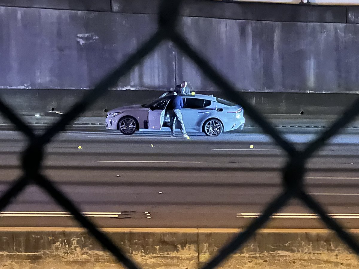 Police investigating a deadly shooting on I-75/I-85 NB. All lanes are shut down near Langford Pkwy. There are dozens of bullet holes in the car detectives are focusing on.