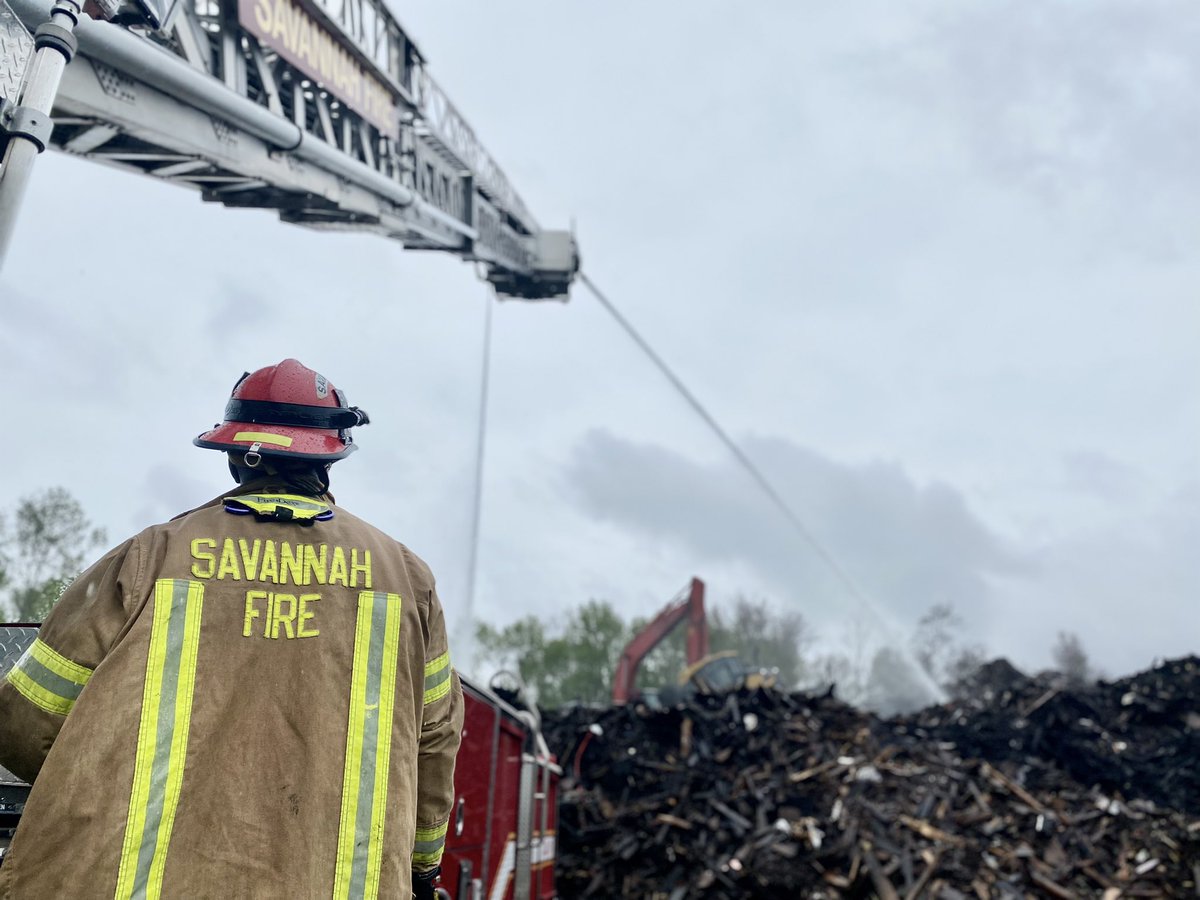 Savannah Firefighters are rapidly progressing through the final mound of smoldering wood chips at a recycling center on Louisville Road