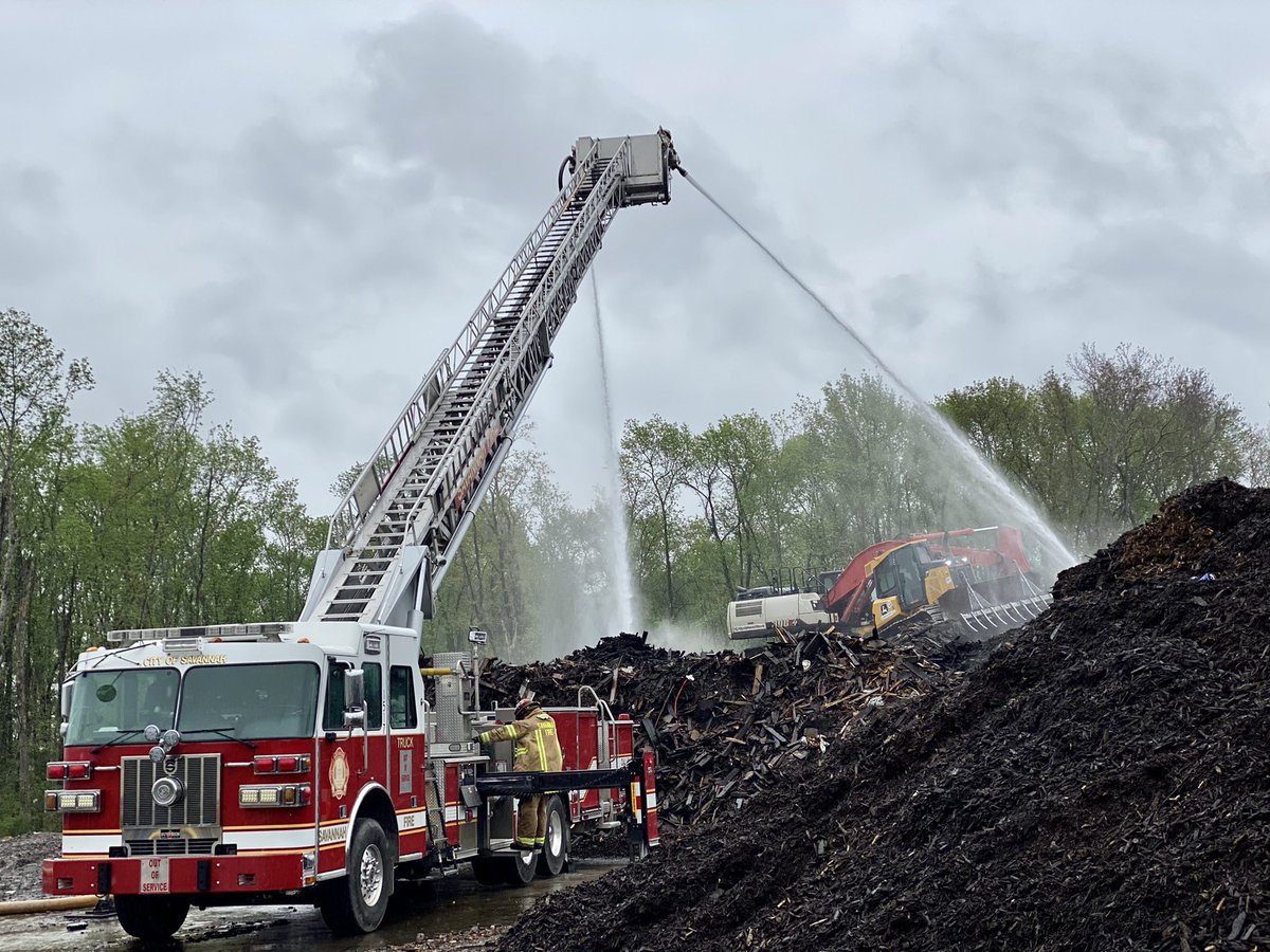 Savannah Firefighters are rapidly progressing through the final mound of smoldering wood chips at a recycling center on Louisville Road