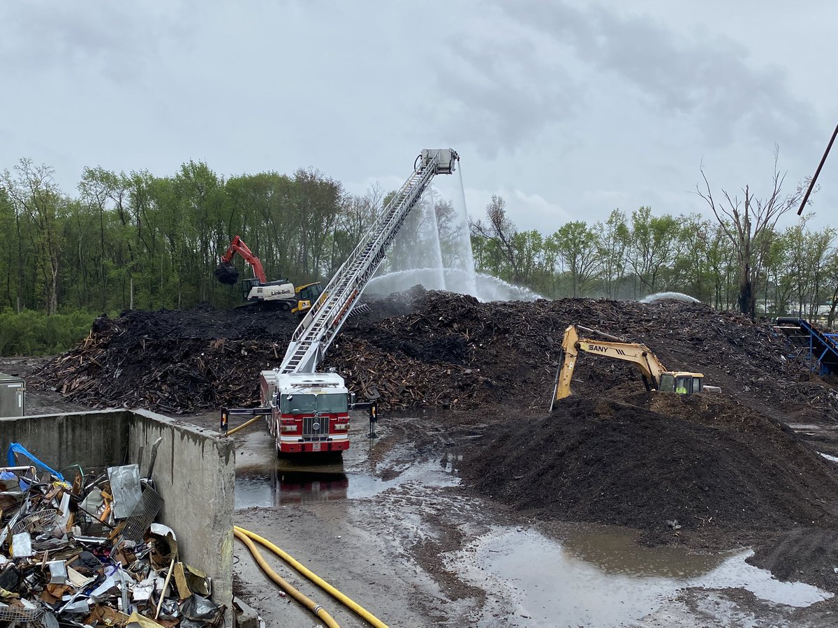 Savannah Firefighters are rapidly progressing through the final mound of smoldering wood chips at a recycling center on Louisville Road