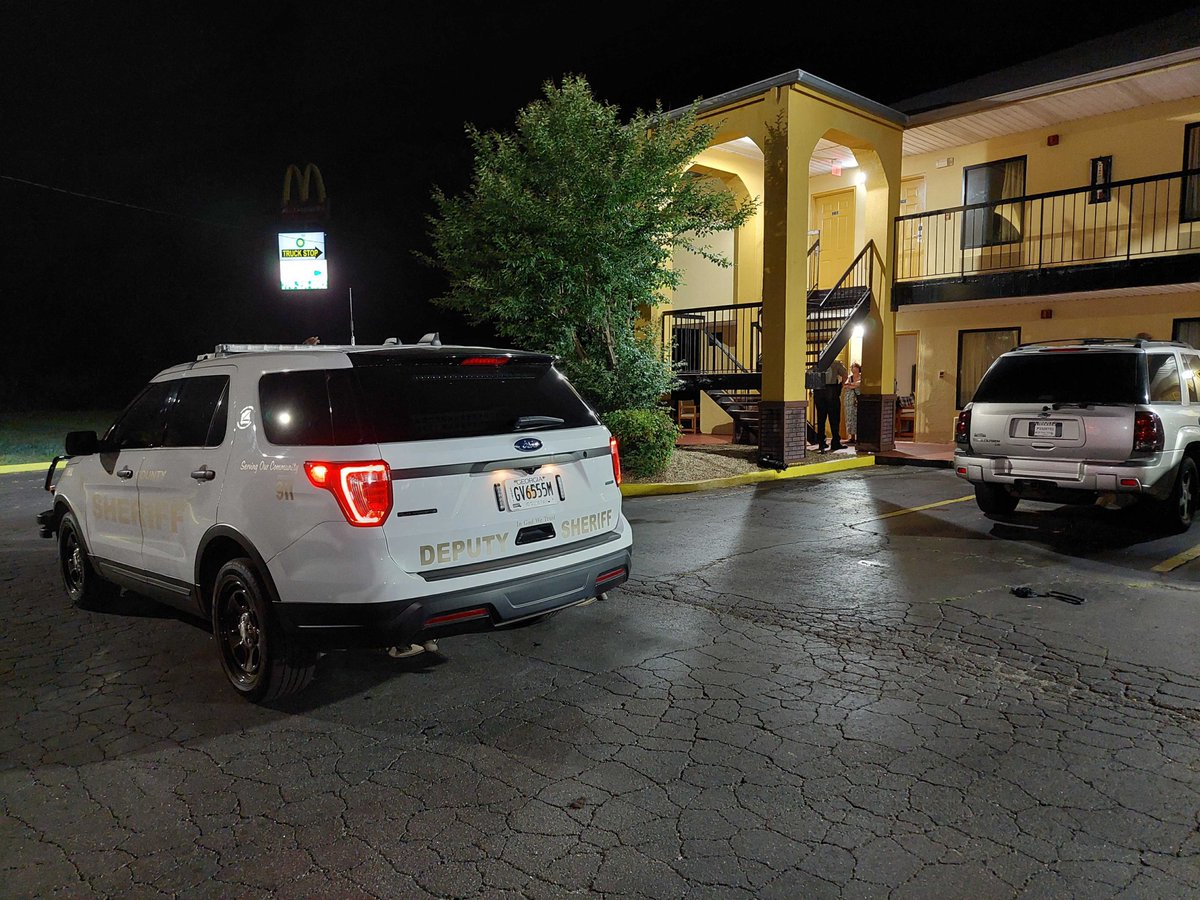 A suspect is in custody after shooting a woman at the America's Best Value Inn on Hwy 29 in Coweta County.  The suspect then barricaded himself at another hotel before eventually surrendering to deputies. 