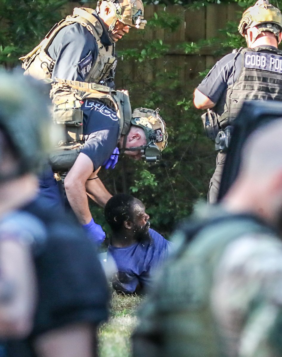 SWAT standoff over at Cobb County apartment complex. Man in custody 