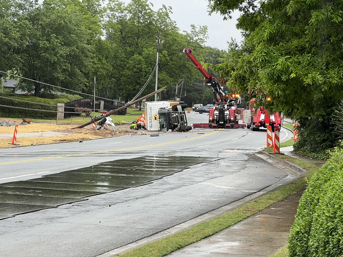 High Haven Road at North Druid Hills is blocked. A Blue Bell Ice Cream truck flipped. The driver told just before 7am, he slid on the metal plates you see on the ground, lost control, flipped & took out a pole &amp; some wires.  