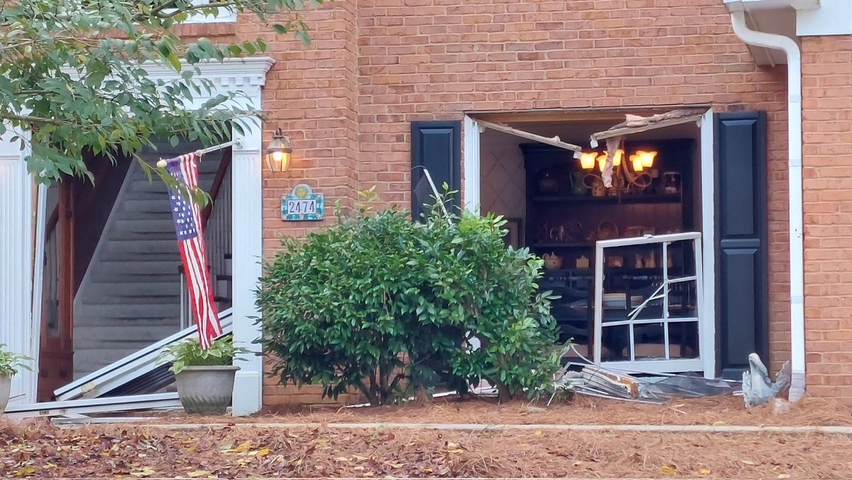 This is the Cobb County house where two @CobbSheriff deputies were killed in the line of duty yesterday. Today, the aftermath of the SWAT standoff is obvious