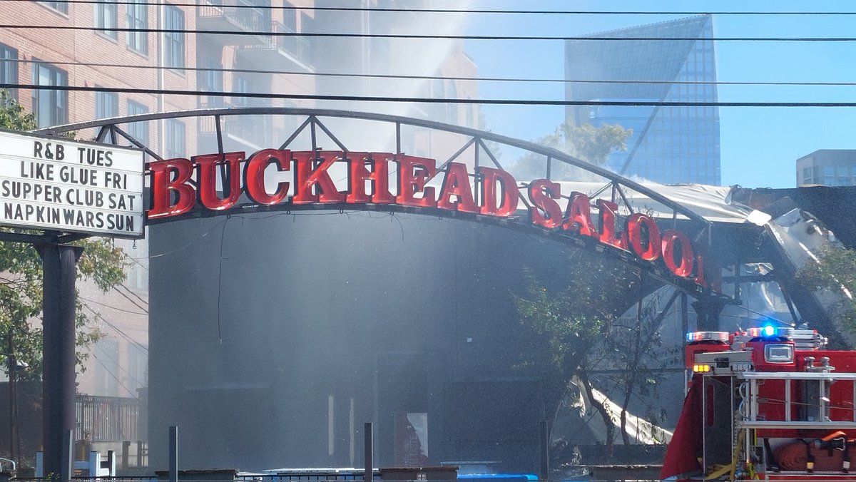 @ATLFireRescue is putting out hot spots at @BuckheadSaloon in Atlanta. Roswell Rd is still closed and smoke still is raising from the structure. Multiple cities FDs responded. fox5atl fire news