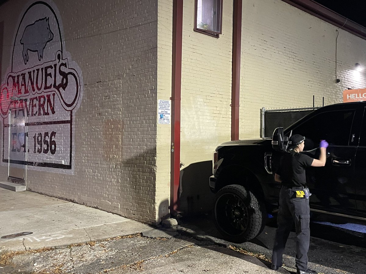 Man gunned down in parking lot of iconic Manuel's Tavern. Detectives think victim was trying to stop gunman from breaking into cars at the NE Atl bar. 