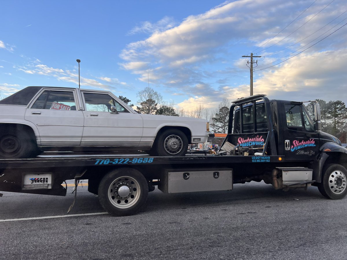 It looks like the scene is clearing and roads are opening back up at Covington Highway and Wellborn Road. This car and two police cars were towed from the officer involved shooting