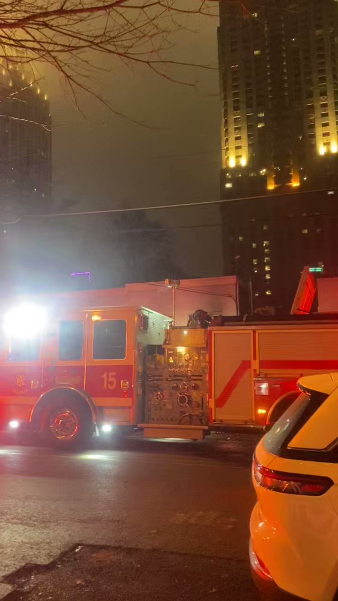 Atlanta firefighters putting out flames at a home on 12th St. in Midtown