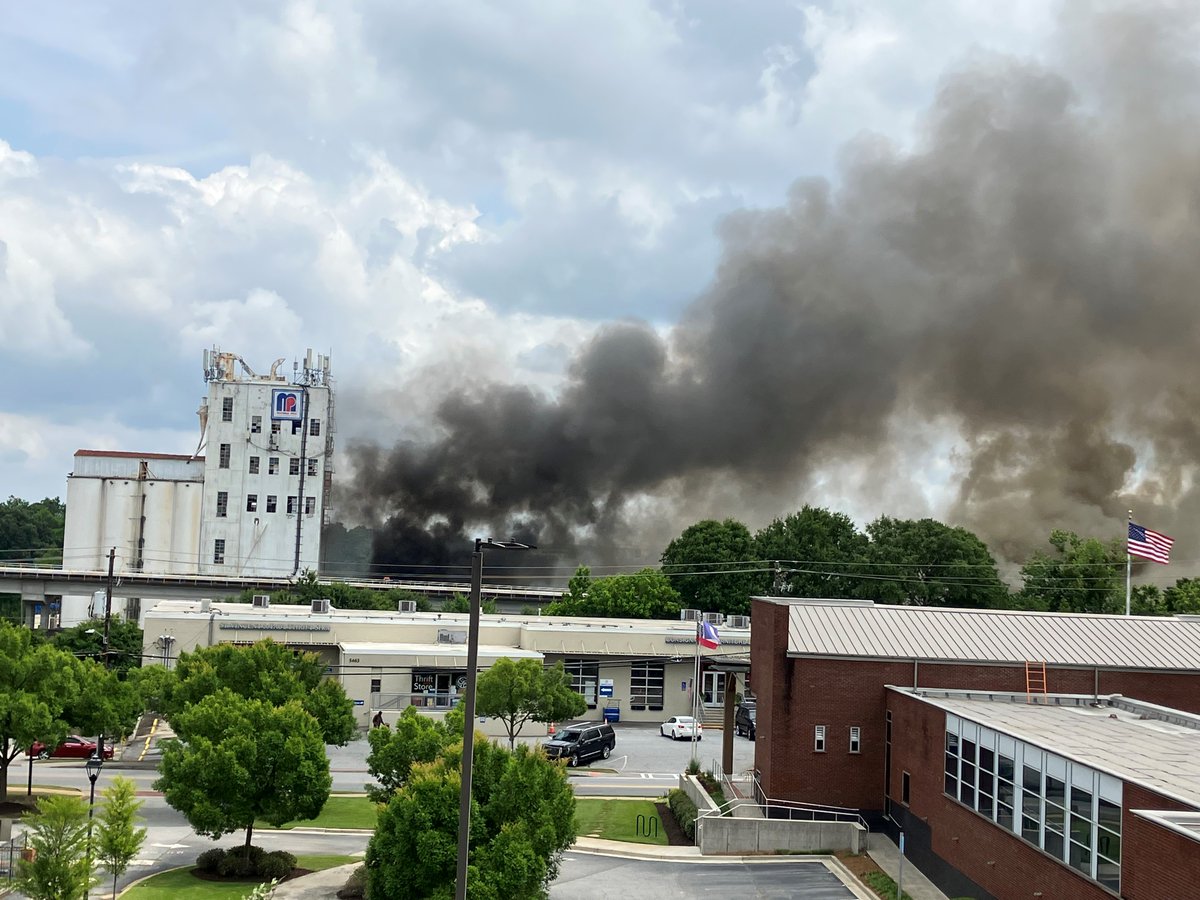 Fire at the Manna Pro building at Chamblee Dunwoody Road and New Peachtree Road. DeKalb County Fire Rescue are currently at the scene.