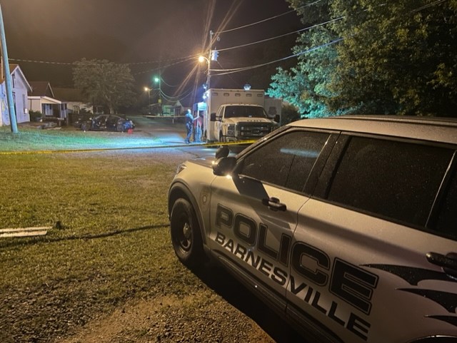 The GBI is investigating a deadly triple shooting that happened near a police station in Lamar County.