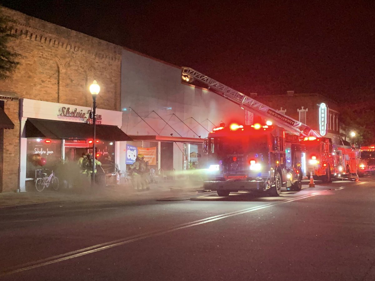 Businesses damaged in late night fire at Covington Square in Newton County. Unclear how many local businesses impacted on the square. Covington FD on scene.