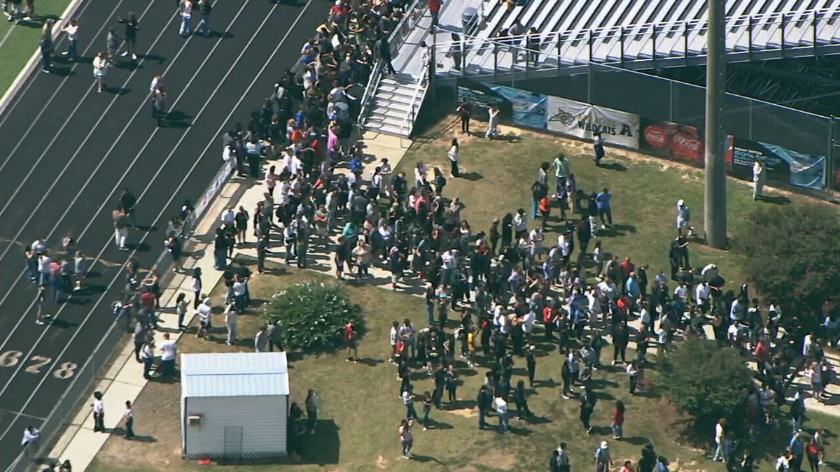 Georgia high school shooting: Suspect in custody, sheriff reports casualties