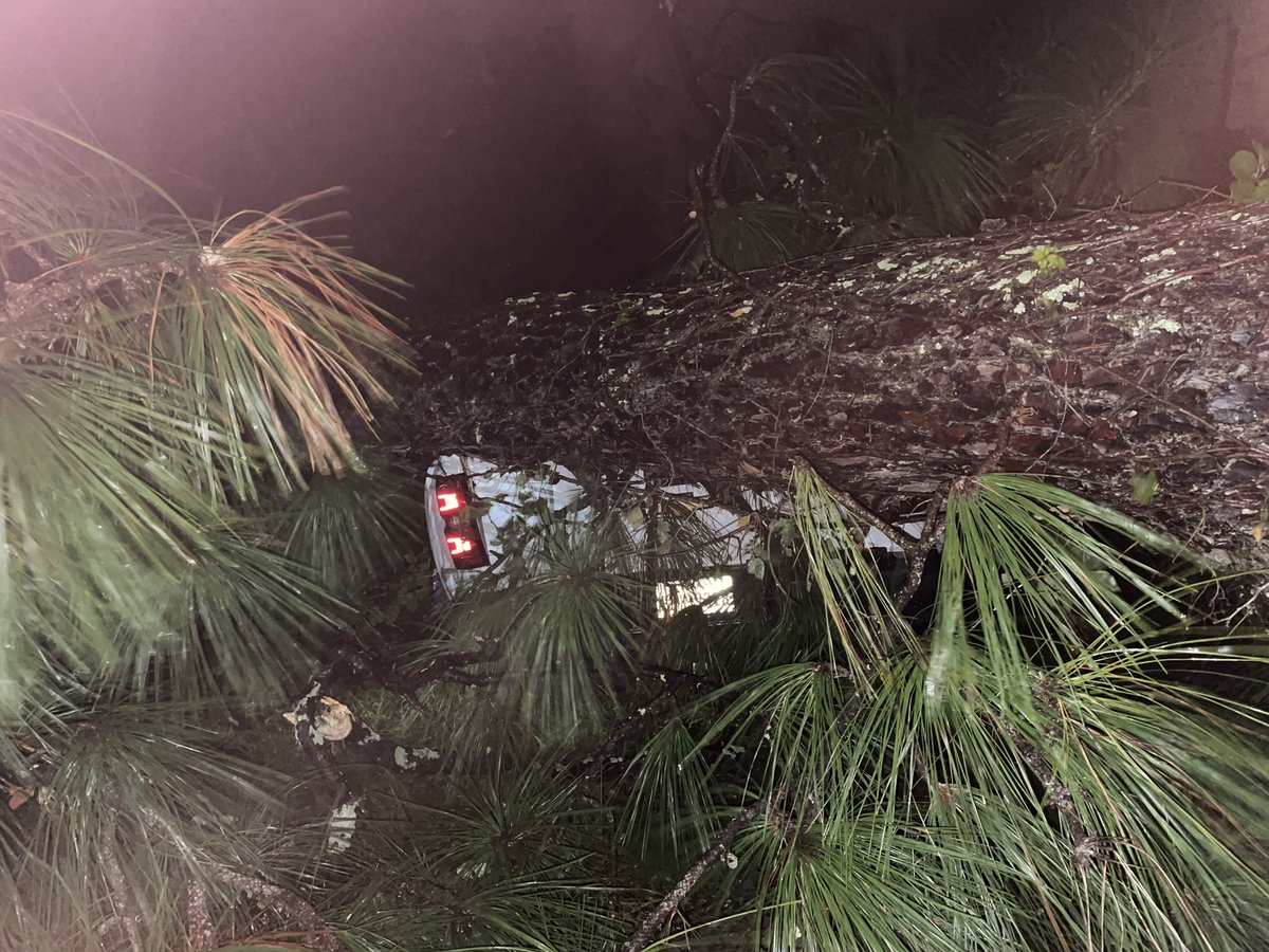 HurricaneHelene is making itself known in Waycross, GA. A massive  tree fell on top of a pick up truck, blocking a roadway on Baltimore Avenue