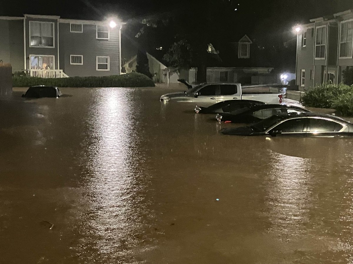 Atlanta fire crews are rescuing residents from their apartments near Buckhead.