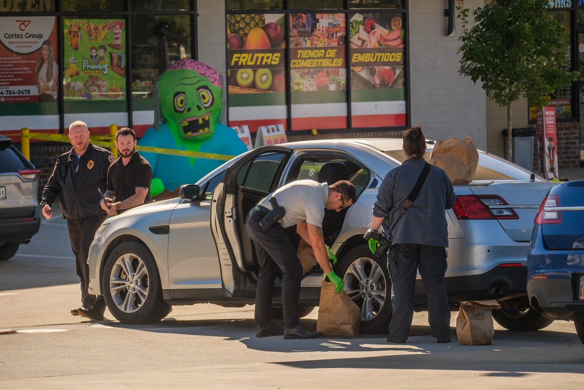 @GwinnettPd have established a crime scene at a gas station on Jimmy Carter Boulevard where they say a man was shot and killed. 