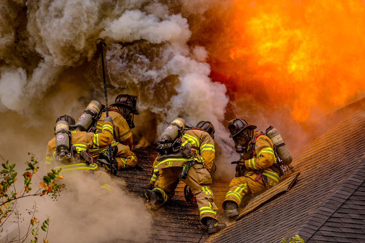 DeKalb Firefighters scaled the roof of this home in Stone Mountain and battled  flames and an overwhelming tower of smoke, saving what they could of the structure. They work to protect life and property, in that order. The homeowner escaped the blaze