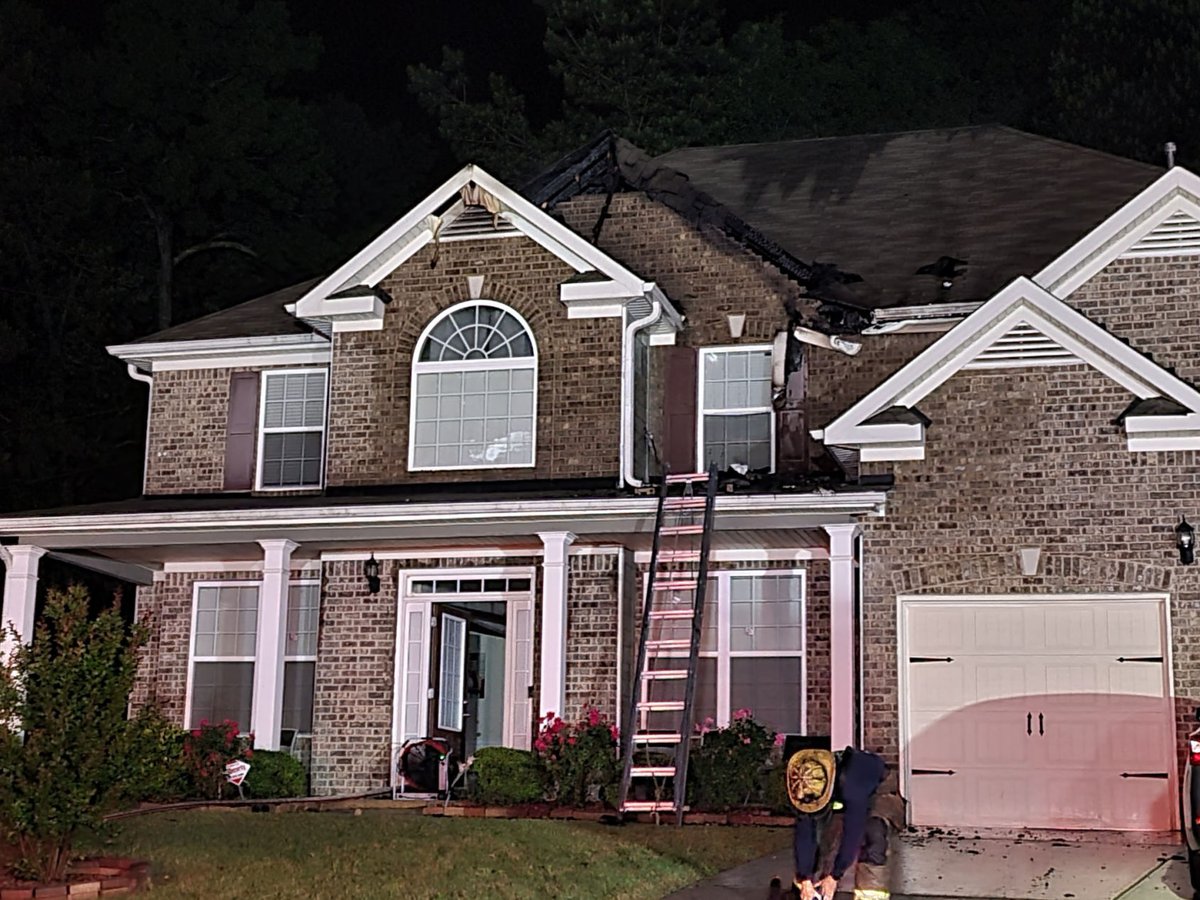 Firefighters worked overnight to put out a house fire in Gwinnett County during storms in the area.