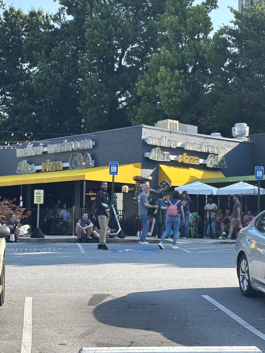 Customers outside after being evacuated from businesses. Fire crews parked outside Trader Joe’s 