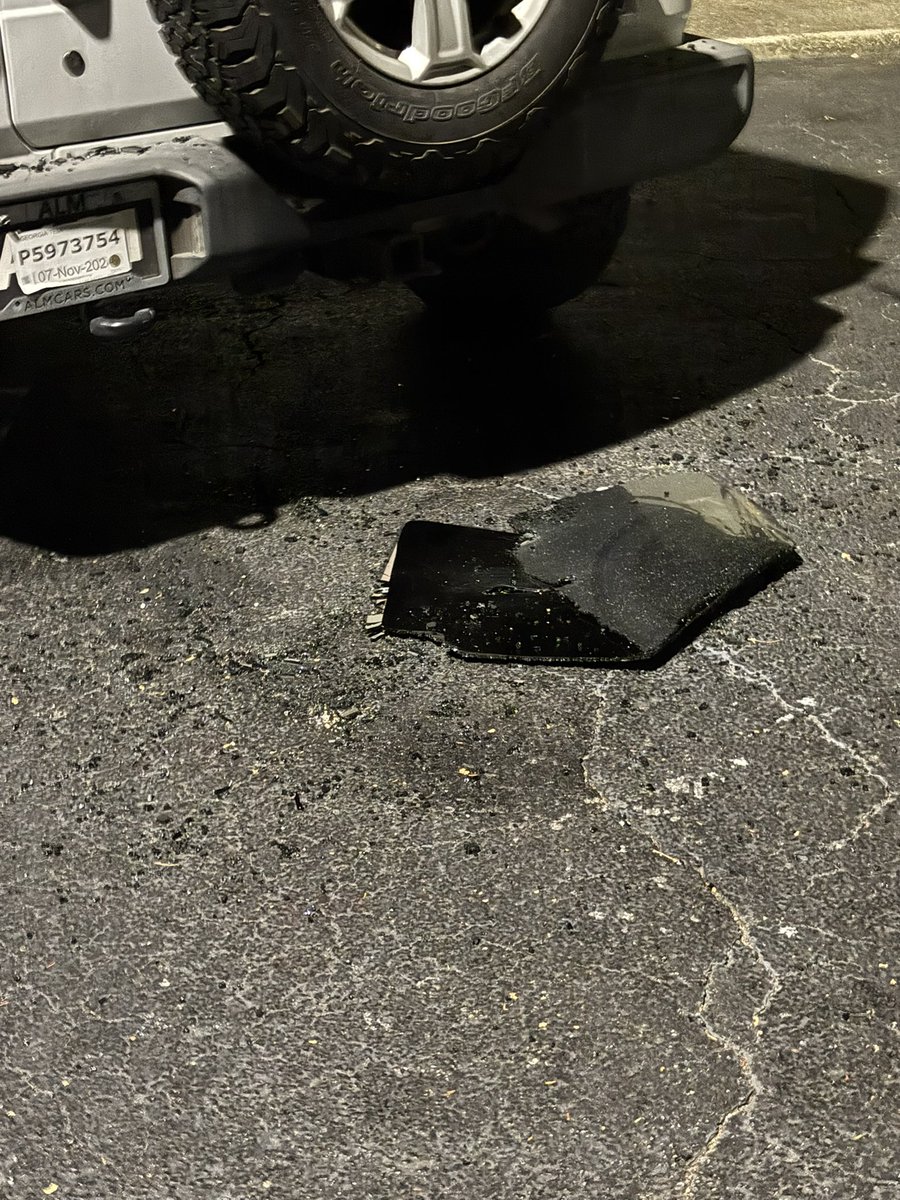 Police investigating a shooting at an apartment complex in East Point.Officers were looking inside a parked Jeep with flashlights.