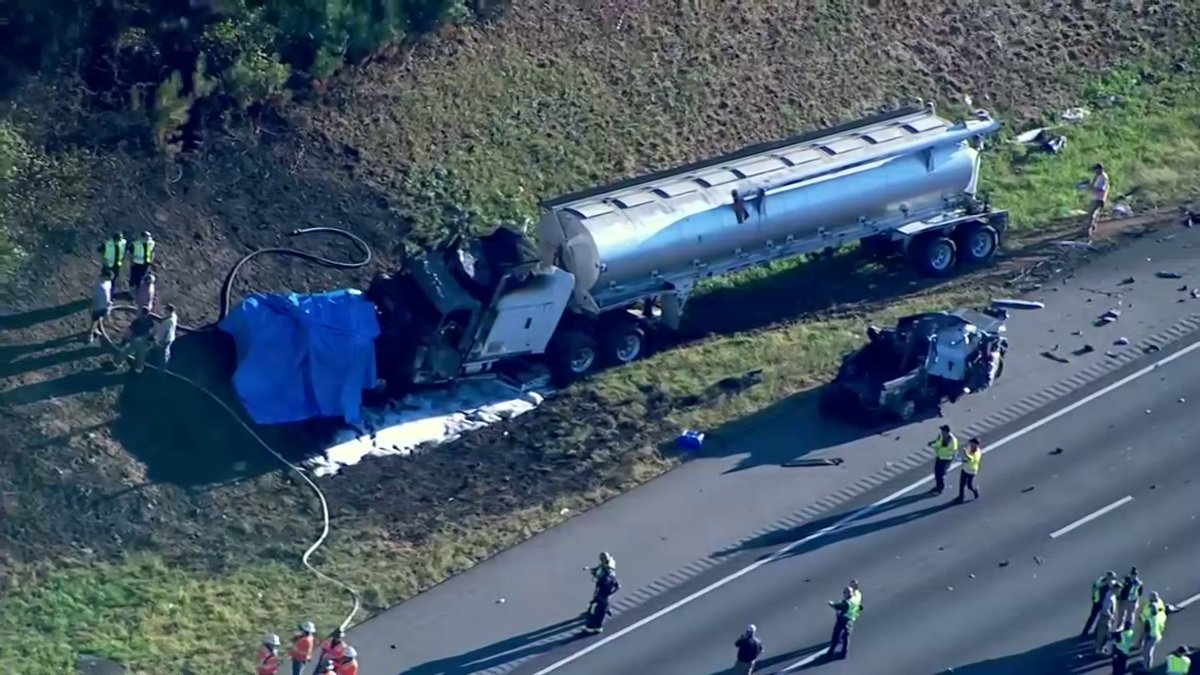8 people killed in fiery crash after tractor-trailer hits van, authorities say